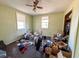 Bedroom with two windows and ceiling fan, needs cleaning at 11253 Old Pee Dee Rd., Hemingway, SC 29554