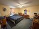 Main bedroom with a king-size bed and dresser at 11253 Old Pee Dee Rd., Hemingway, SC 29554