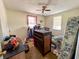 Bedroom with a bookcase and window, needs cleaning at 11253 Old Pee Dee Rd., Hemingway, SC 29554