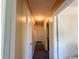 Long hallway with doors leading to other rooms at 11253 Old Pee Dee Rd., Hemingway, SC 29554