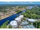 Aerial view showing community amenities including tennis courts and waterway access at 1313 Villa Marbella Ct. # 101, Myrtle Beach, SC 29572