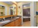 Bathroom boasts double sinks, granite counters, and a jetted tub at 1313 Villa Marbella Ct. # 101, Myrtle Beach, SC 29572