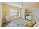 Bright bedroom with a comfortable bed and large window at 1313 Villa Marbella Ct. # 101, Myrtle Beach, SC 29572