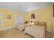 Guest bedroom with two twin beds and ceiling fan at 1313 Villa Marbella Ct. # 101, Myrtle Beach, SC 29572