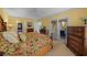 Main bedroom with king-size bed and access to a balcony at 1313 Villa Marbella Ct. # 101, Myrtle Beach, SC 29572