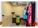 Spacious walk-in closet with shelving and hanging rods at 1313 Villa Marbella Ct. # 101, Myrtle Beach, SC 29572