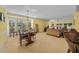 Bright dining area with seating for six and large windows at 1313 Villa Marbella Ct. # 101, Myrtle Beach, SC 29572