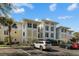 Luxury condo building with inviting architecture and ample parking at 1313 Villa Marbella Ct. # 101, Myrtle Beach, SC 29572