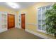 Building hallway with two doors and carpeted flooring at 1313 Villa Marbella Ct. # 101, Myrtle Beach, SC 29572