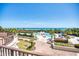 Expansive pool area with ocean views and lawn games at 1313 Villa Marbella Ct. # 101, Myrtle Beach, SC 29572