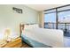 Relax in this bedroom with a queen bed and a balcony with city views, perfect for vacation at 1501 S Ocean Blvd. # 811, Myrtle Beach, SC 29577