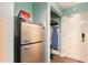 Hallway area features a retro refrigerator, storage area, and convenient access to the unit's entrance at 1501 S Ocean Blvd. # 811, Myrtle Beach, SC 29577