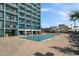 Lounge by the outdoor pool with plenty of seating and ocean views at 1501 S Ocean Blvd. # 811, Myrtle Beach, SC 29577