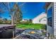 Backyard oasis featuring a hot tub, pond with fountain, and lush landscaping for a peaceful outdoor retreat at 1579 Southwood Dr., Surfside Beach, SC 29575