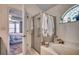 Bright bathroom featuring a shower, soaking tub and decorated stained glass window at 1579 Southwood Dr., Surfside Beach, SC 29575