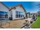 Rear of home with covered outdoor living and views of the backyard at 1579 Southwood Dr., Surfside Beach, SC 29575