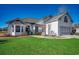Charming single-Gathering home featuring a well-manicured lawn and attached two-car garage at 1579 Southwood Dr., Surfside Beach, SC 29575
