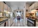 Bright kitchen with white cabinetry, modern appliances, eat-in area, and great natural light at 1579 Southwood Dr., Surfside Beach, SC 29575