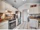 Functional kitchen design with white cabinets, stainless steel appliances, and granite countertops at 1579 Southwood Dr., Surfside Beach, SC 29575