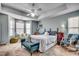 Spacious main bedroom with sitting area, tray ceiling, and comfortable furnishings at 1579 Southwood Dr., Surfside Beach, SC 29575