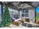 Covered porch with wicker furniture and a ceiling fan at 1579 Southwood Dr., Surfside Beach, SC 29575