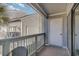 Balcony with view of neighboring building and landscaping at 1891 Colony Dr. # 13D, Surfside Beach, SC 29575