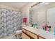 Clean bathroom with shower/tub combo and neutral decor at 1891 Colony Dr. # 13D, Surfside Beach, SC 29575