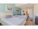 Two twin beds in a spacious bedroom with ensuite bathroom access at 1891 Colony Dr. # 13D, Surfside Beach, SC 29575