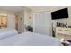 Two twin beds, large closet and TV in bright bedroom at 1891 Colony Dr. # 13D, Surfside Beach, SC 29575