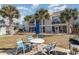 Community courtyard with seating and grill, perfect for outdoor gatherings at 1891 Colony Dr. # 13D, Surfside Beach, SC 29575