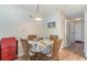 Bright dining area with table and chairs, ideal for small meals at 1891 Colony Dr. # 13D, Surfside Beach, SC 29575