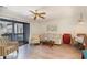 Living room with balcony access and comfortable seating at 1891 Colony Dr. # 13D, Surfside Beach, SC 29575