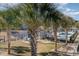 Relaxing pool area with lush landscaping and a hot tub at 1891 Colony Dr. # 13D, Surfside Beach, SC 29575