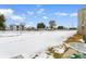 Snowy backyard with partial view of street at 2000 Green Blvd. # 40B, Myrtle Beach, SC 29577