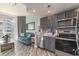 Modern kitchen with stainless steel appliances and gray cabinets at 2501 S Ocean Blvd. # 1219, Myrtle Beach, SC 29577