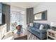 Relaxing living room with balcony access, comfortable seating, and coastal decor at 2501 S Ocean Blvd. # 1219, Myrtle Beach, SC 29577