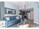Open concept living room with a view into the kitchen and comfortable seating at 2501 S Ocean Blvd. # 1219, Myrtle Beach, SC 29577