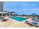 Outdoor pool overlooking the ocean, complete with lounge chairs at 2501 S Ocean Blvd. # 1219, Myrtle Beach, SC 29577