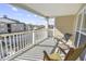 Relaxing balcony with rocking chairs and scenic views at 260 S Crow Creek Dr. # 18, Calabash, NC 28467