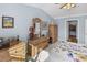 Bright bedroom with wood furniture and walk-in closet at 260 S Crow Creek Dr. # 18, Calabash, NC 28467