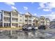 Attractive building exterior with ample parking at 260 S Crow Creek Dr. # 18, Calabash, NC 28467
