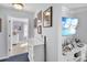 Bright hallway with access to bedroom and a built-in entertainment center at 260 S Crow Creek Dr. # 18, Calabash, NC 28467