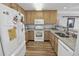 Well-equipped kitchen featuring granite countertops and modern appliances at 260 S Crow Creek Dr. # 18, Calabash, NC 28467