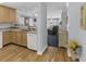 Open kitchen with granite countertops and a view into the living room at 260 S Crow Creek Dr. # 18, Calabash, NC 28467