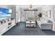 Comfortable living room with sectional sofa and access to balcony at 260 S Crow Creek Dr. # 18, Calabash, NC 28467