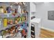 Well-organized pantry with ample shelving and a washer and dryer at 260 S Crow Creek Dr. # 18, Calabash, NC 28467