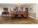 Dining room with hardwood floors and large table at 2647 Coats Rd., Loris, SC 29569
