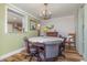 Elegant dining room featuring a round table and chandelier at 2647 Coats Rd., Loris, SC 29569