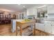 Open kitchen with island and view into dining area at 2647 Coats Rd., Loris, SC 29569