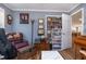 Home office with built-in shelving and comfortable seating at 2647 Coats Rd., Loris, SC 29569